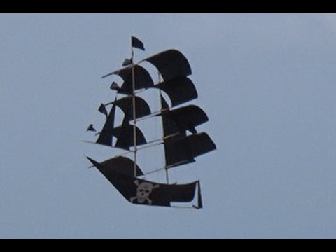 A pirate ship kite on a Bali beach.